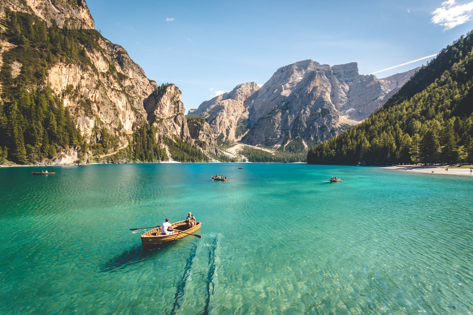 Mountain lake with a rowing boat